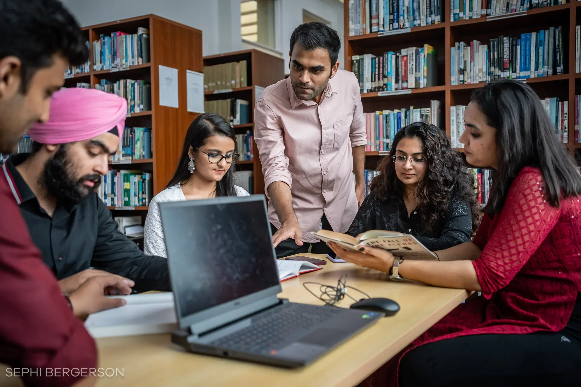 gim admission eligibility section showing students discussing studies
